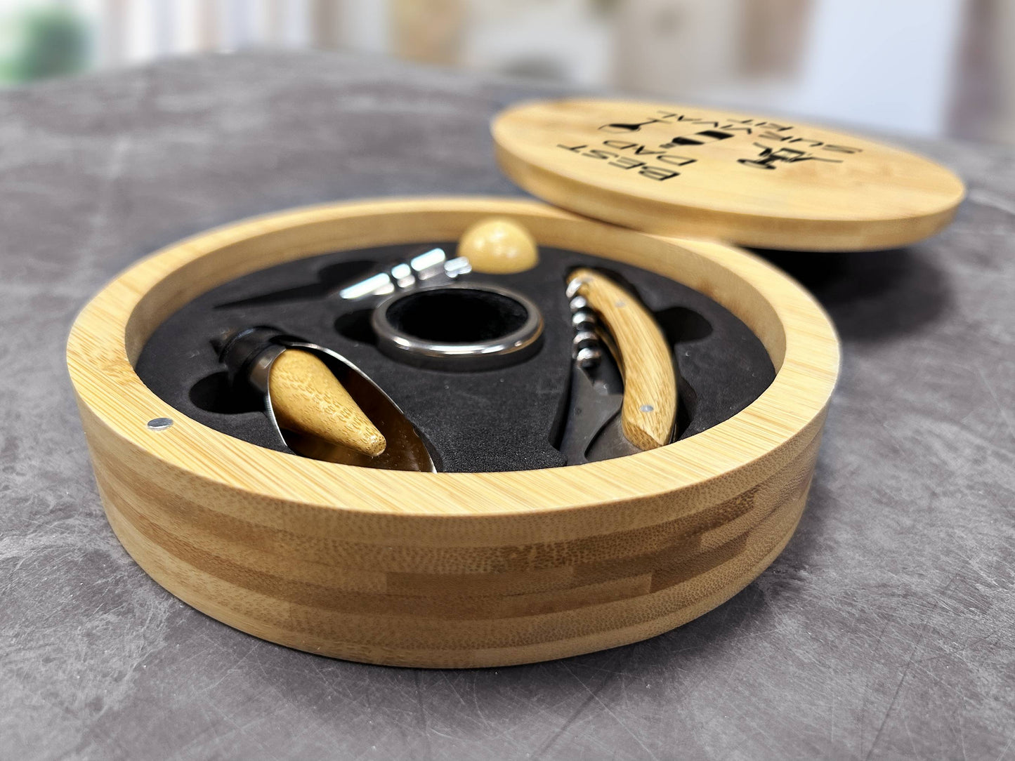 Elegant bamboo wine tool set showing custom printed dad design in sophisticated setting